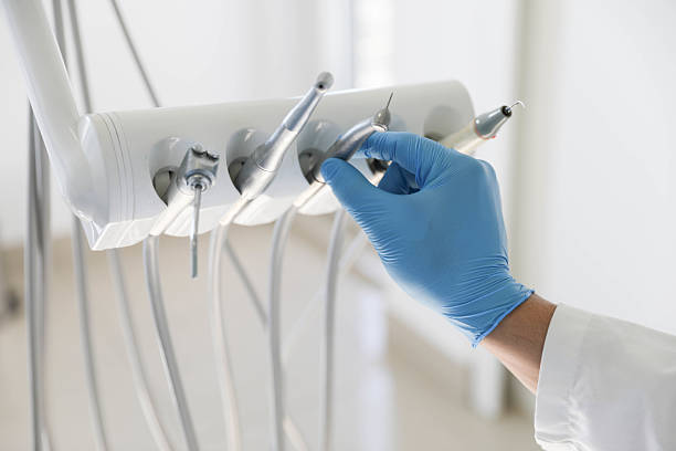 Professional Emergency Dentist technician working in East Northport, NY
